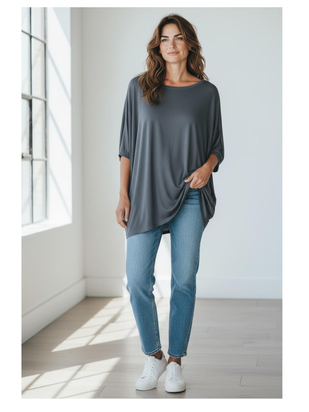 Flirty Long Line Dipped Back Knit
Top