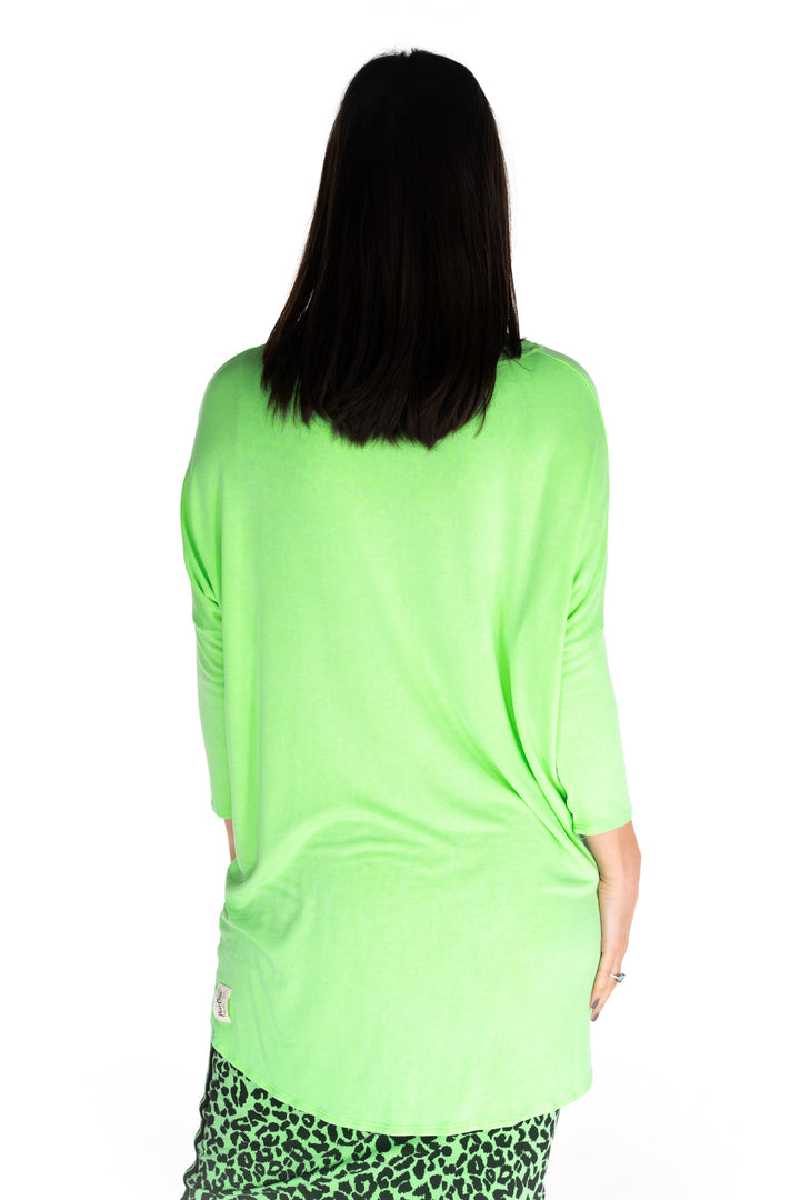 Flirty Long Line Dipped Back Knit Top